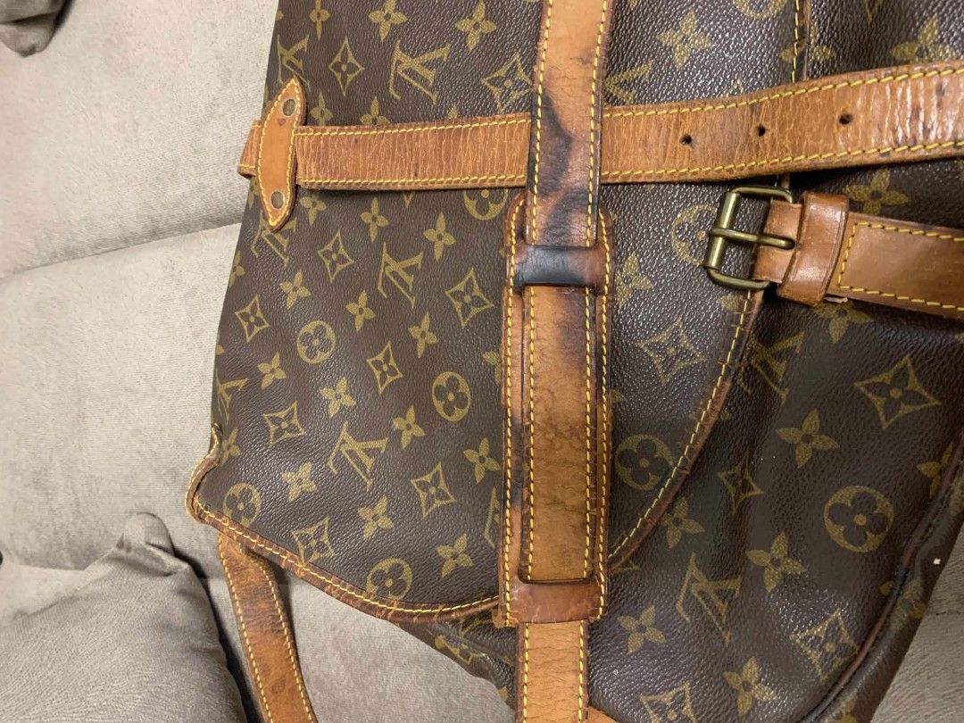 Louis Vuitton Monogram Canvas Saumur Backpack Bag (Category: Luxury Bags & Wallets) located in Marikina City. Submitted by mitch_arc444 (Listing ID 1466071882, Image 1). Description: - Brand: Louis Vuitton - Material: Monogram Canvas with Vachetta leather trim - Origin: Made in France (Date Code: Negotiable AR0912) - Interior: Brown textile lining with an open compartment - Closure & Straps: Buckle closure flap and adjustable shoulder straps - Co