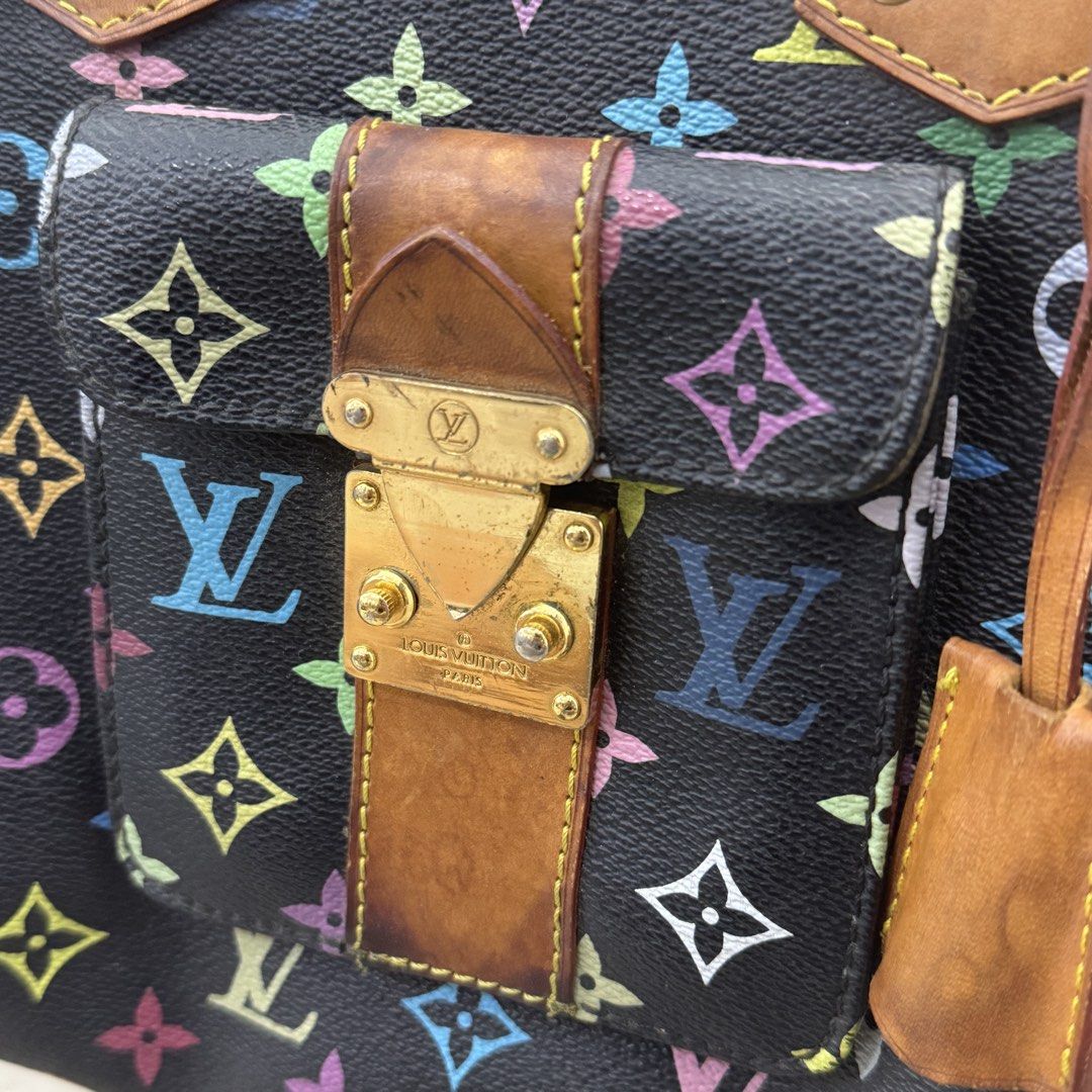 Louis Vuitton Monogram Multicolore Black Speedy 30 Bag (Category: Luxury Bags & Wallets) located in Manila. Submitted by wisecloud_1b4b3c (Listing ID 1466041616, Image 3). Description: - Brand/Model: Louis Vuitton x Takashi Murakami Multicolore Speedy - Color/Material: Black canvas with iconic multicolor monogram - Features: Front pocket with push-lock closure, rolled leather top handles - Condition: Vintage with character, natural honey patina o