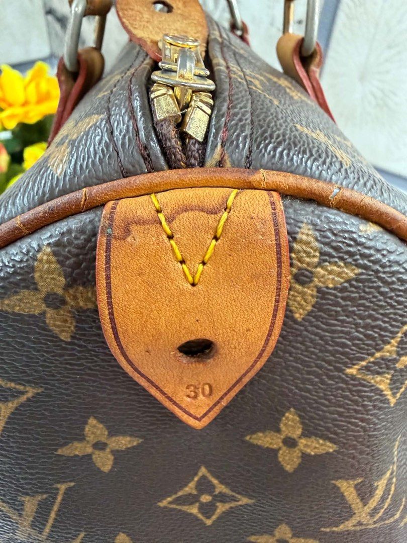 Louis Vuitton Speedy 30 Monogram Canvas (Category: Luxury Bags & Wallets) located in Angono. Submitted by xxxallaboutbagsxxx (Listing ID 1466007468, Image 3). Description: - Brand: Louis Vuitton - Model: Speedy 30 (Made in France) - Material: Signature Monogram coated canvas with vachetta leather trim - Hardware: Gold-tone - Interior: Brown textile lining with a handy slip pocket - Condition/Details: Classic everyday purse featuring a gorgeous ho