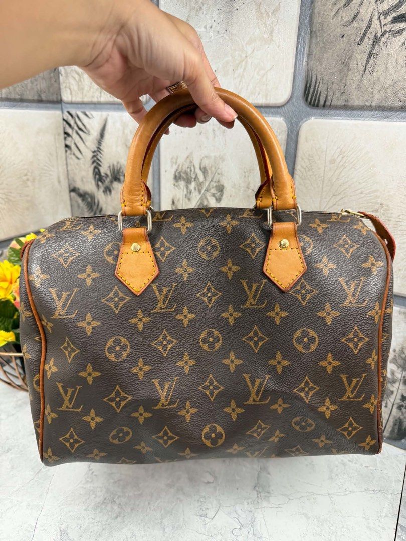 Louis Vuitton Speedy 30 Monogram Canvas (Category: Luxury Bags & Wallets) located in Angono. Submitted by xxxallaboutbagsxxx (Listing ID 1466007468, Image 1). Description: - Brand: Louis Vuitton - Model: Speedy 30 (Made in France) - Material: Signature Monogram coated canvas with vachetta leather trim - Hardware: Gold-tone - Interior: Brown textile lining with a handy slip pocket - Condition/Details: Classic everyday purse featuring a gorgeous ho