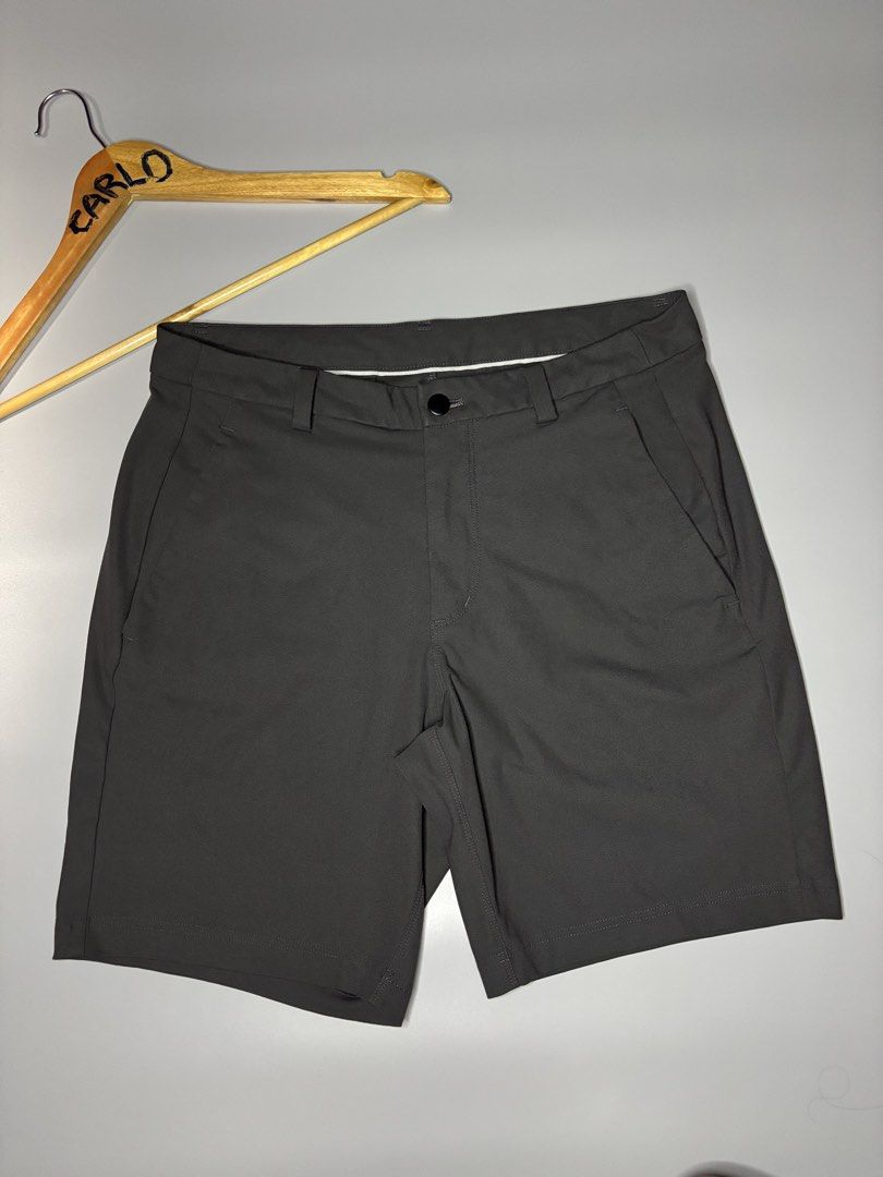 LULULEMON SHORTS (Category: Shorts) located in Bayambang. Submitted by lo_keythrifting (Listing ID 1465994098, Image 3). Description: - Brand: Lululemon - Condition: Brand new condition - Waist: 32-34 - Length: 18 - Color rate: 10/10 - No issue - Model: ABC Shorts - Color: Dark Grey - Size: 34 (Tag inside zippered pocket) - Condition: Clean fabric, minimal wear - Features: Belt loops, front slash pockets, back welt pockets, and secure zippered po