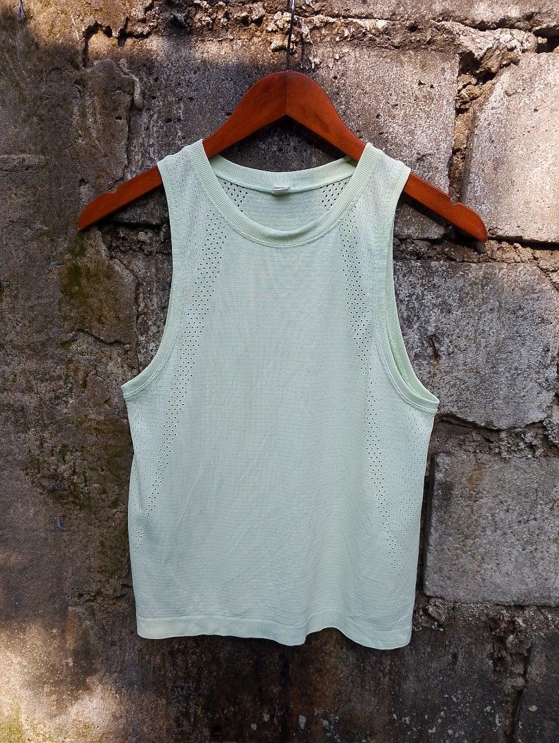 Lululemon Train to Be Tank Top (Category: Activewear) located in Baliuag. Submitted by retrovault83 (Listing ID 1465987762, Image 3). Description: ✨ Condition: 9/10 – Excellent Preloved Condition 📏 Measurements (Flat Lay, Tagged Size 4): • Pit to Pit: 16 • Length: 21.5 ✅ Details: • Light mint green / pistachio colorway with engineered mesh ventilation panels • Seamless, lightweight construction with Silverescent® anti-stink technology • Signatur