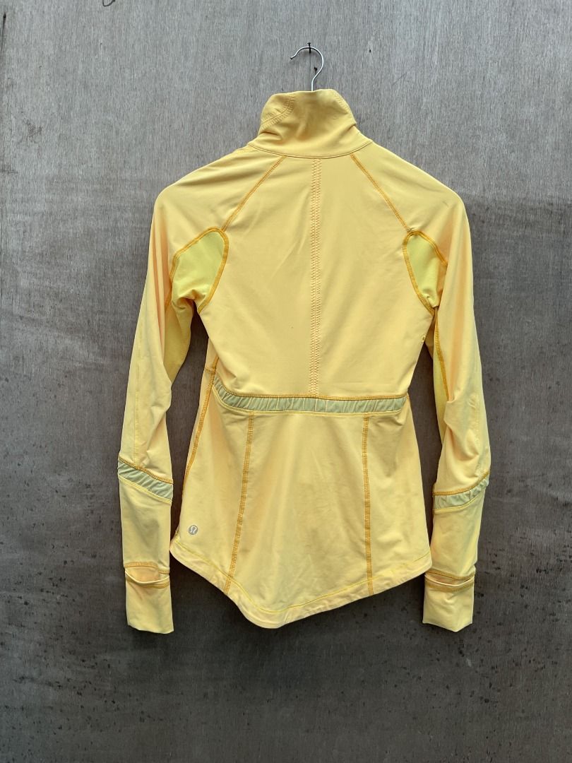 Lululemon Yellow Athletic Jacket Zip Up Size 6 (Category: Coats, Jackets and Outerwear) located in Talisay. Submitted by justindanielle17 (Listing ID 1466041855, Image 3). Description: -Authentic -16 x 26 inches in dimensions -Excellent conditions -9.8/10 Color rate - Brand: Lululemon - Size: 6 - Color: Bright yellow - Stand collar design with front zipper pockets - Sleeves feature thumbholes and ribbed cuffs - Mesh ventilation panels at the shou