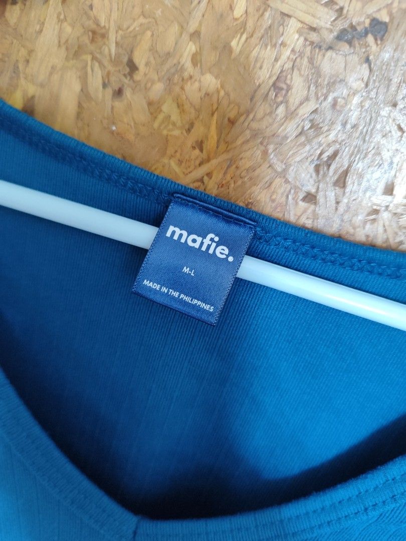 Mafie Nikki Top (Category: Blouses) located in Mandaluyong City. Submitted by luxienn (Listing ID 1465972142, Image 2). Description: Mafie Nikki Top Never Used Size: Medium to Large Color: Teal Fabric: Ribbed Knit Rfs: Doesn't suit me.