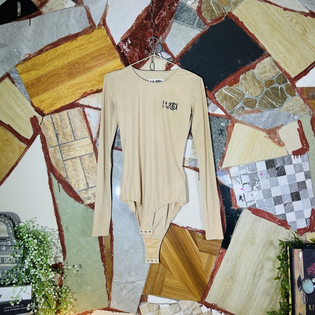 Maison margiela body suit (Category: Luxury Apparel) located in Baguio. Submitted by kckc_luxury (Listing ID 1466082005, Image 3). Description: 🌸 TINY PINK SPOTS ARE LENS DAMAGE, NOT CLOTH STAINS ————————— ❗️KINDLY READ BEFORE MAKING AN OFFER❗️ LISTING DETAILS size:S-M width x length (inches):20x30 condition: EXCELLENT --- MOP: Gcash / BPI MOD: J&T / JRS LOCATION: Baguio City --- NOTE: • Manage your expectations • Photos did not go under any edi