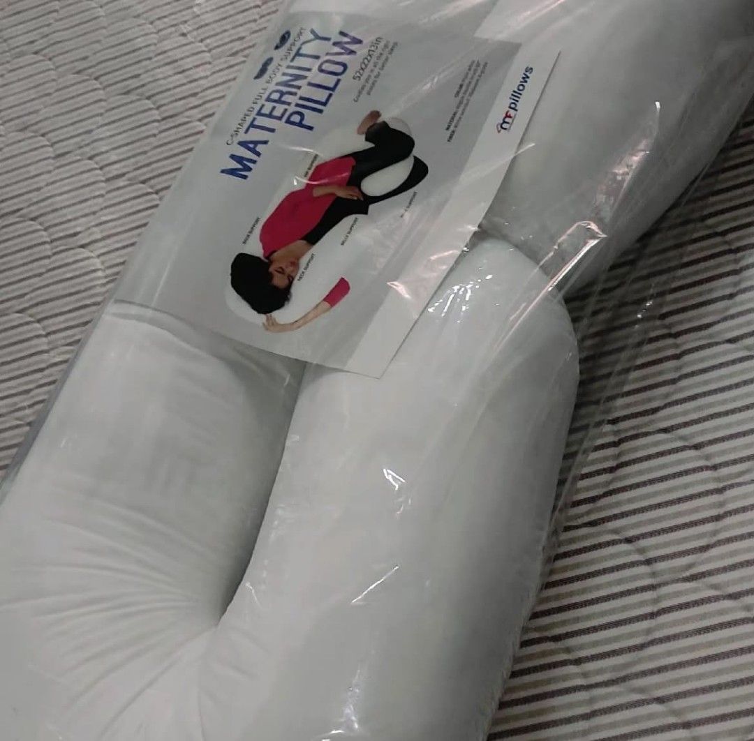 Mandaue Foam C-Shaped Maternity Pillow (Category: Maternity Care) located in San Pablo. Submitted by izablessed (Listing ID 1466095123, Image 1). Description: - Brand: Mandaue Foam - Item: C-shaped Full Body Support Pillow - Color: White - Dimensions: 52 x 30 x 13 inches - Features: Ergonomic design that provides essential support for the neck, back, and belly, making it ideal for pregnancy.