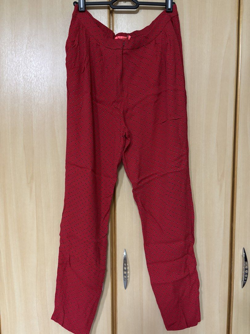 Mango Basic Red Patterned Trousers Size M (Category: Other Bottoms) located in Petaling Jaya. Submitted by anonymous_j (Listing ID 1465995268, Image 1). Description: - Brand: Mango Basic - Color/Pattern: Red with tiny black & white patterns - Fit: Elastic waistband in the back for extra comfort - Fabric: Lightweight and breathable, ideal for daily wear - Size: EUR M - Origin: Made in China - Condition: Clean, well-maintained pre-loved condition.