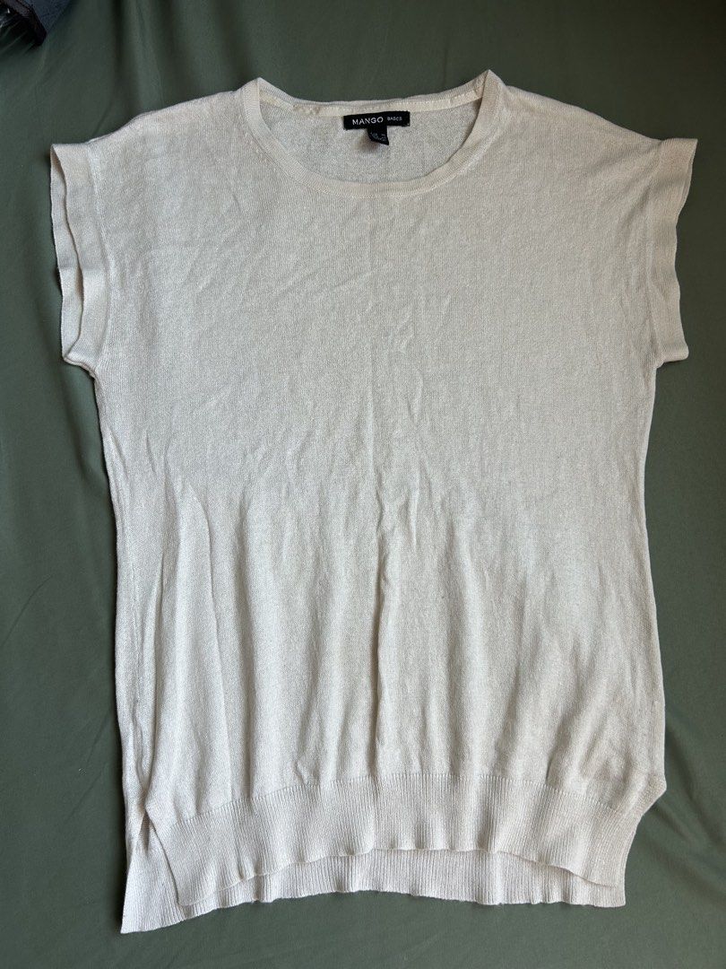 Mango Basic Top (Category: Blouses) located in Quezon City. Submitted by hygge.elements (Listing ID 1465962309, Image 1). Description: Mango Basic Semi See-Through Top.. perfect for summer, hot weather.. pre-loved item. Still in good condition. 🤍.