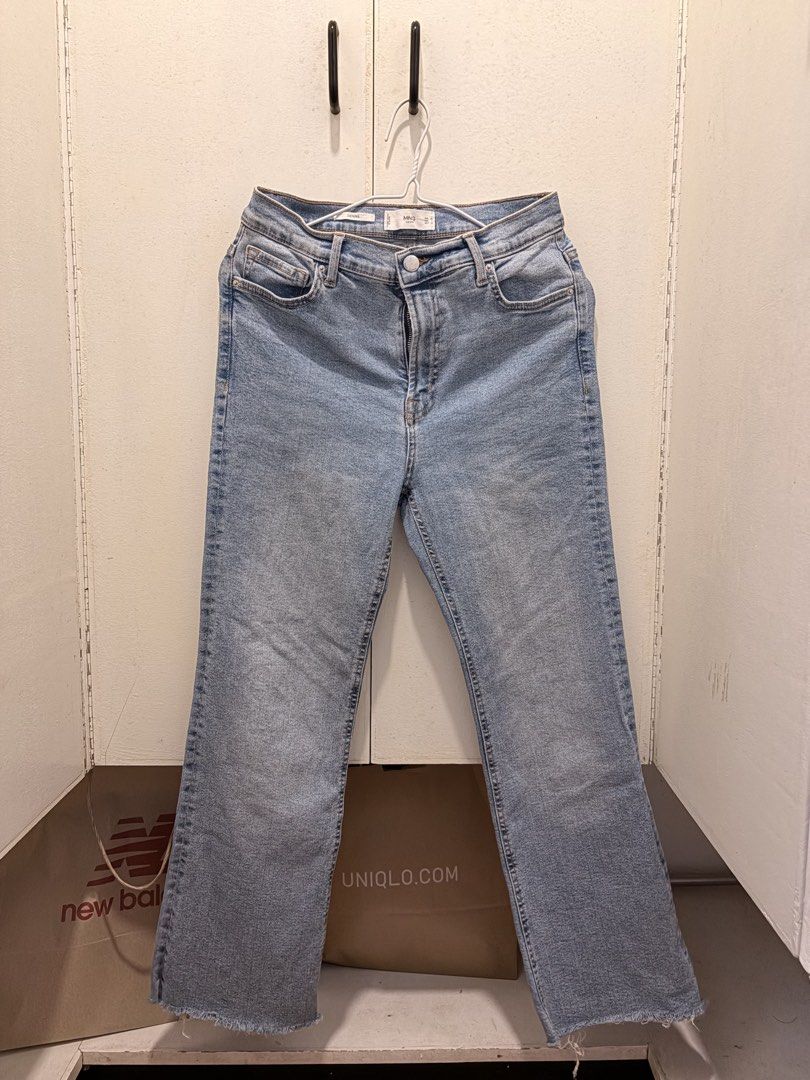 Mango Sienna Light Blue Denim Jeans (Category: Jeans) located in Pasay City. Submitted by notellyyyy (Listing ID 1465991271, Image 1). Description: SEE LAST IMAGE FOR FLAW. KINDA FLARE AT THE BOTTOM:) STILL WEARABLE!- Brand/Model: Mango Sienna Denim Jeans - Color/Wash: Light Blue / Light Wash - Details: Raw hem edges, classic button and zip fly, front and back pockets - Condition: Great overall, with a tear near the back belt loop (shown in close