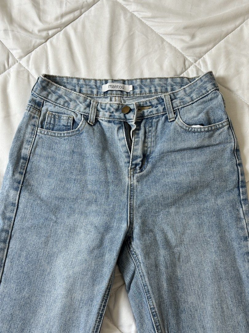 Mantou Light Blue Denim Jeans Raw Hem (Category: Jeans) located in Makati City. Submitted by walkw1thstyle (Listing ID 1466049871, Image 2). Description: - Brand/Style: Mantou light wash blue denim jeans - High-waisted with a straight leg cut - Raw frayed ankle hem, contrast stitching - Fits XS and S frames.
