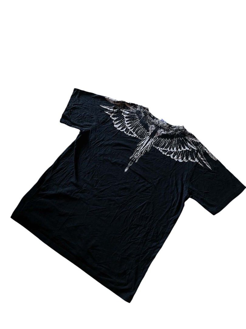 MARCELO BURLON (Category: Tshirts & Polo Shirts ) located in Baguio. Submitted by ford_sah (Listing ID 1465956874, Image 3). Description: 🪽MARCRLO BURLON EAGLE WINGS🪽 DIMES: 22W 27L PHP 599 Shipped 📍BAGUIO CITY ‼️NO ISSUE‼️.
