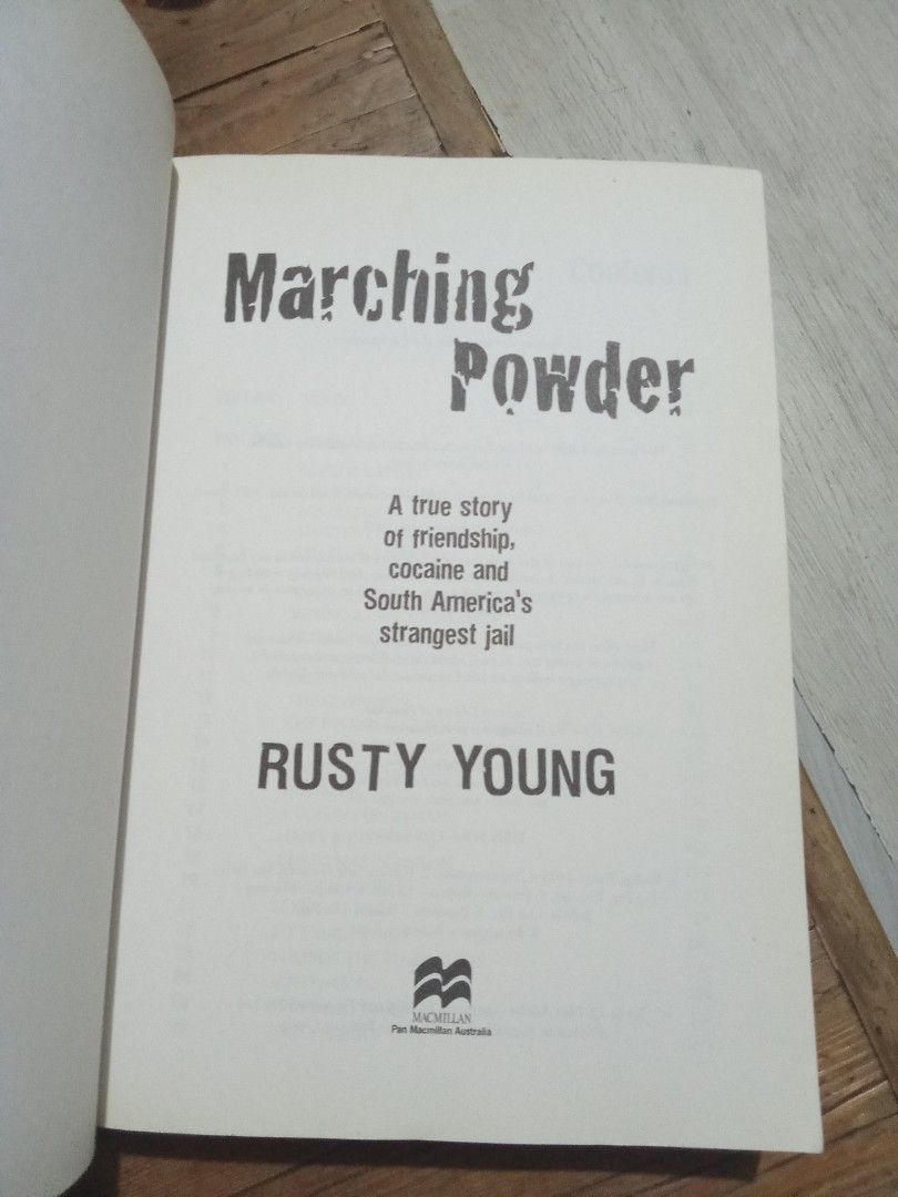 Marching Powder by Rusty Young (Category: Storybooks) located in Pasig City. Submitted by teebeedeee (Listing ID 1466066911, Image 2). Description: - Title: Marching Powder - Author: Rusty Young - Genre: True Crime / Non-Fiction - Format: Paperback - Publisher: Pan Macmillan Australia - Plot: True story of Thomas McFadden, an English drug smuggler inside Bolivia's infamous San Pedro prison, featuring cocaine labs, inmate self-governance, and a un