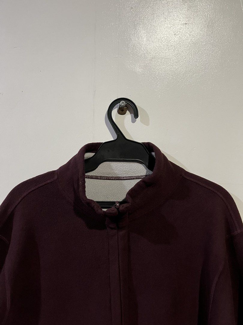 Maroon Fleece Zip-Up Jacket with Pockets (Category: Coats, Jackets and Outerwear) located in Manila. Submitted by updilimangaragesale (Listing ID 1466147021, Image 1). Description: - Color: Maroon with soft grey interior lining - Design: Full zip-up closure, high collar, and two front pockets - Material: Soft and warm fleece, ideal for cold weather layering - Condition: Clean overall with no major flaws spotted.