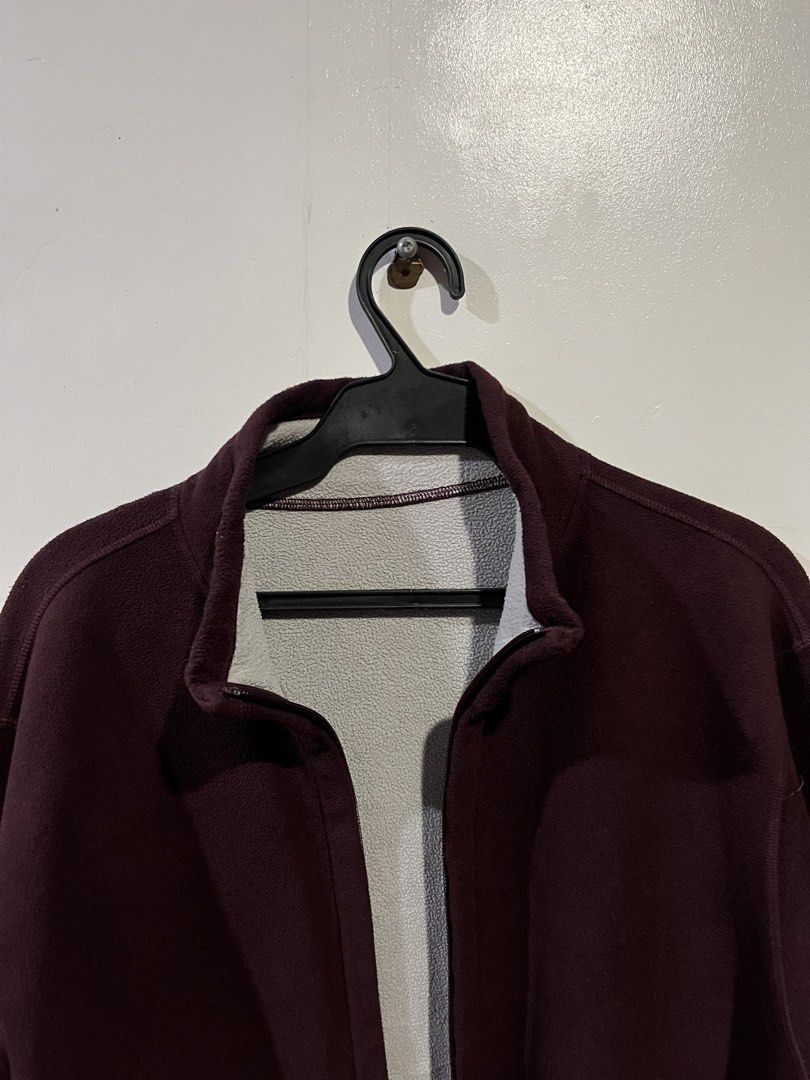 Maroon Fleece Zip-Up Jacket with Pockets (Category: Coats, Jackets and Outerwear) located in Manila. Submitted by updilimangaragesale (Listing ID 1466147021, Image 2). Description: - Color: Maroon with soft grey interior lining - Design: Full zip-up closure, high collar, and two front pockets - Material: Soft and warm fleece, ideal for cold weather layering - Condition: Clean overall with no major flaws spotted.