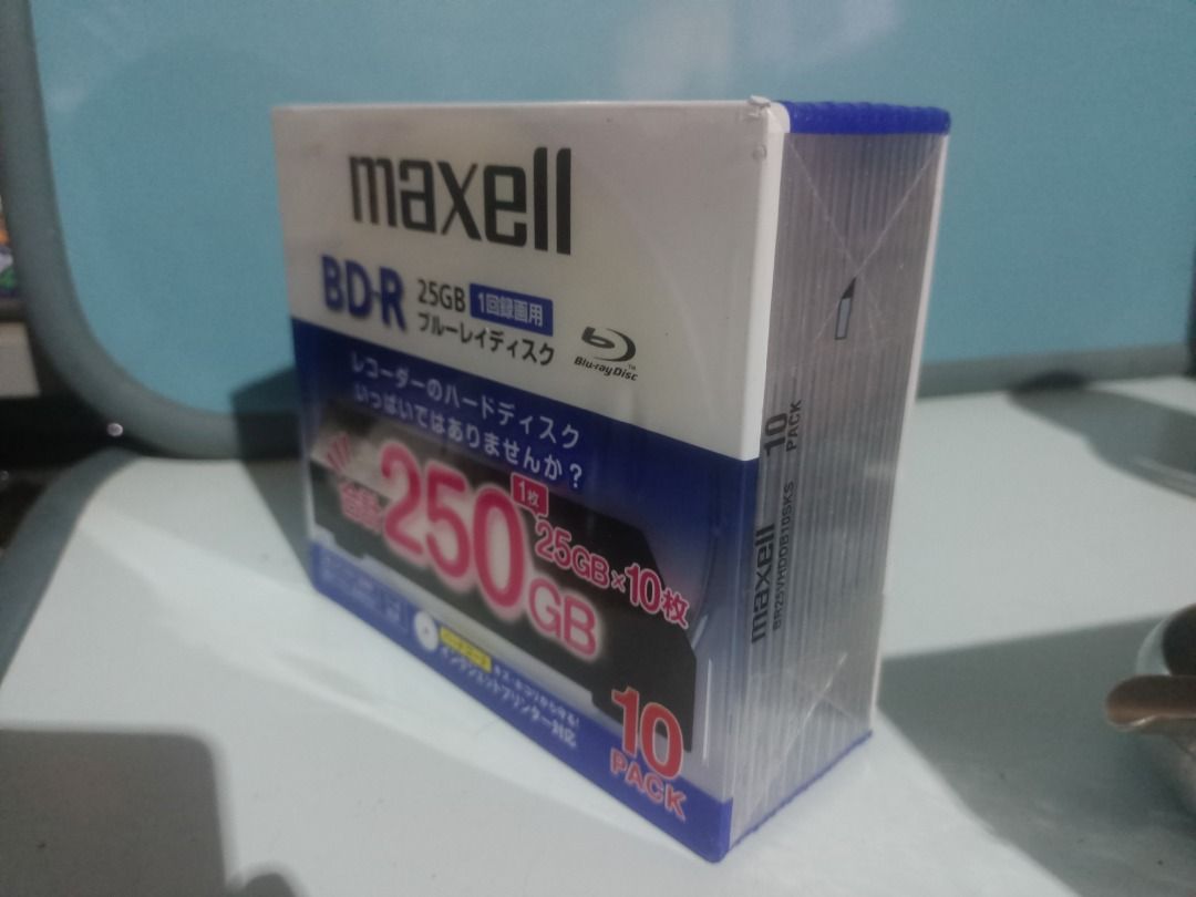 Maxell BD-R 25GB 10 Pack Blu-ray Discs (Category: Blu-Ray & Media Players) located in Munoz. Submitted by larryc1212 (Listing ID 1466127615, Image 3). Description: - Brand: Maxell - Type: BD-R Blank Discs (25GB capacity each) - Quantity: 10-pack in original plastic wrap case - Speed: Supports 1-4x recording speed - Protection: Hard coat against scratches and dust - Surface: Inkjet printer compatible - Origin: Authentic Japanese import packaging D