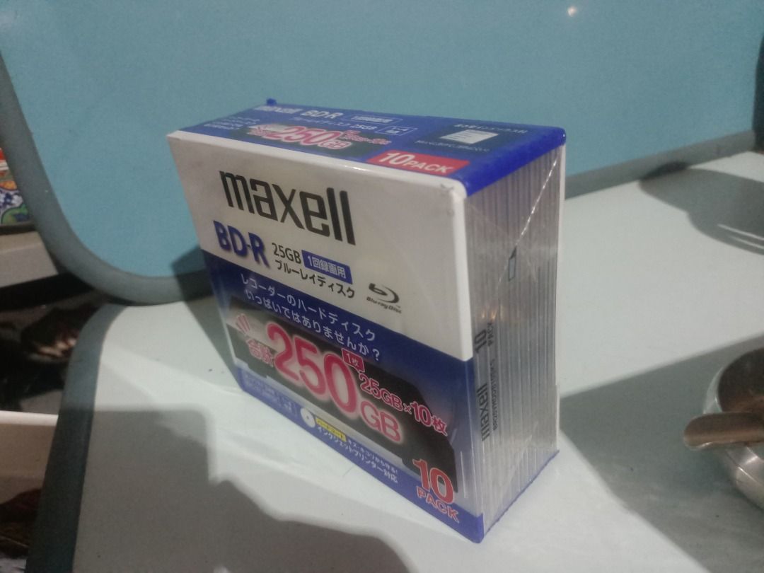 Maxell BD-R 25GB 10 Pack Blu-ray Discs (Category: Blu-Ray & Media Players) located in Munoz. Submitted by larryc1212 (Listing ID 1466127615, Image 2). Description: - Brand: Maxell - Type: BD-R Blank Discs (25GB capacity each) - Quantity: 10-pack in original plastic wrap case - Speed: Supports 1-4x recording speed - Protection: Hard coat against scratches and dust - Surface: Inkjet printer compatible - Origin: Authentic Japanese import packaging D