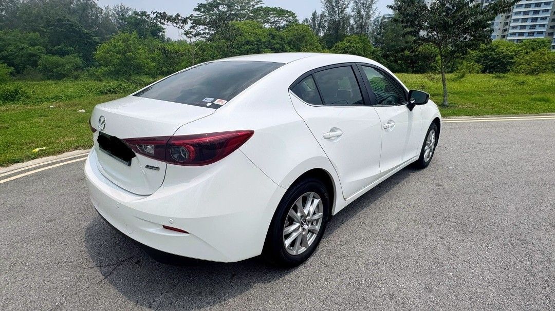 Mazda 3 Sedan 1.5 SP (A) (Category: Used Cars) located in Singapore. Submitted by justanotherlee (Listing ID 1466132801, Image 3). Description: + LOW Mileage Mazda 3 1.5A w/ Sunroof + Well-loved car looking for a new owner! 🥲 - Very lightly used, pearl white exterior and beige+black leather interior in near-pristine condition - Technically 2nd owner, but actually just parents passing ownership to us to get cheaper insurance premium 😅 - Fully ac