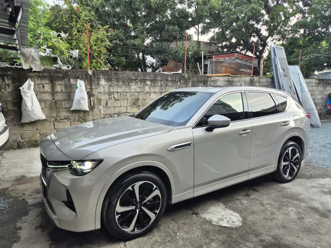 Mazda CX-60 CX-60 Auto (Category: Used Cars) located in Paranaque City. Submitted by jagggg (Listing ID 1466154835, Image 2). Description: Mazda CX-60 Hybrid | Gas Platinum Quartz 2024 Model 3.3L 8AT Automatic transmission 6-cylinder gas engine 13.6K Mileage Casa Maintained First Owner No issues Complete and Clean Papers ₱2.4M negotiable 📍Location : Parañaque City | Las Piñas City.