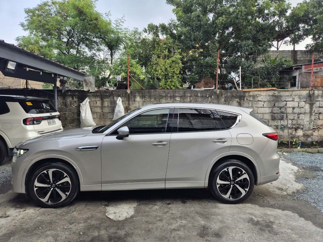 Mazda CX-60 CX-60 Auto (Category: Used Cars) located in Paranaque City. Submitted by jagggg (Listing ID 1466154835, Image 3). Description: Mazda CX-60 Hybrid | Gas Platinum Quartz 2024 Model 3.3L 8AT Automatic transmission 6-cylinder gas engine 13.6K Mileage Casa Maintained First Owner No issues Complete and Clean Papers ₱2.4M negotiable 📍Location : Parañaque City | Las Piñas City.