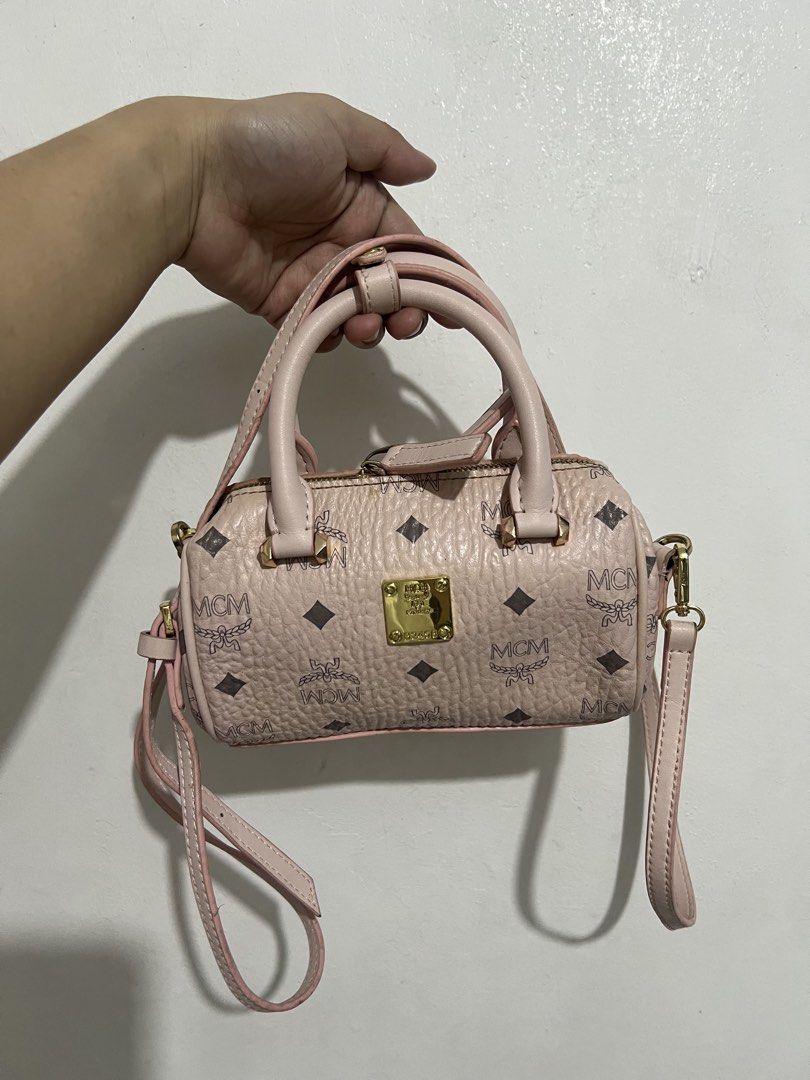 MCM monogram sling bag (Category: Luxury Bags & Wallets) located in Manila. Submitted by pppsss_____ (Listing ID 1466074939, Image 1). Description: original w/ code needs to be cleaned but still in good condition and it's really pretty ♡.