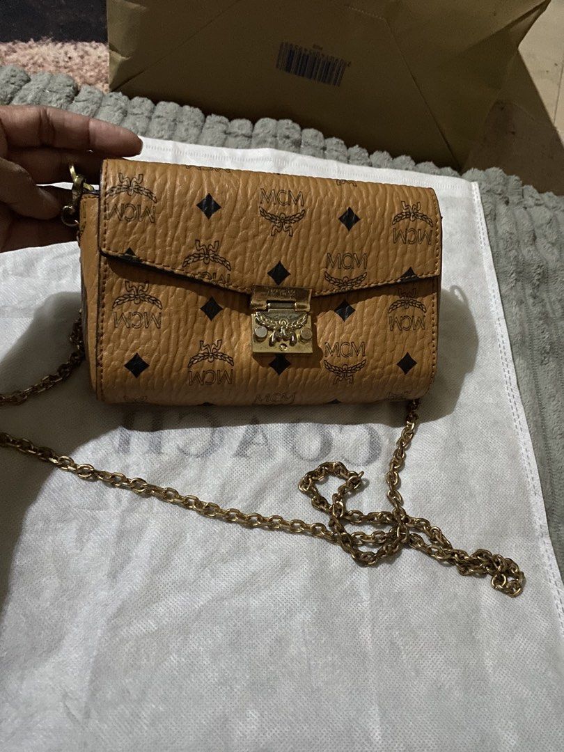 MCM Visetos Monogram Designer Handbag Collection (Category: Luxury Bags & Wallets) located in Muntinlupa City. Submitted by prettythess (Listing ID 1466155200, Image 1). Description: - Iconic MCM monogram print with luxurious brown pebbled leather texture - Elegant gold-tone hardware details - Multiple styles available: shoulder bags, mini bowling bags, and tote bags - Select designs feature playful rabbit patches - Spacious interiors ideal for d