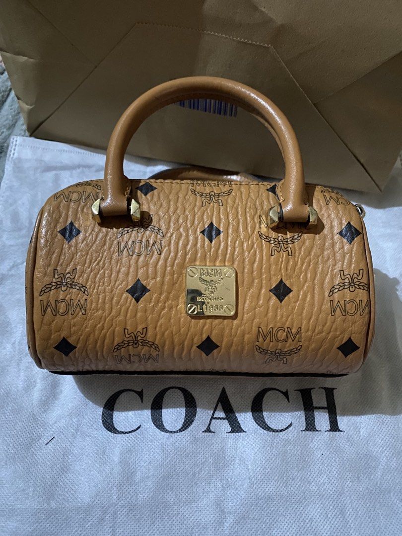 MCM Visetos Monogram Designer Handbag Collection (Category: Luxury Bags & Wallets) located in Muntinlupa City. Submitted by prettythess (Listing ID 1466155200, Image 2). Description: - Iconic MCM monogram print with luxurious brown pebbled leather texture - Elegant gold-tone hardware details - Multiple styles available: shoulder bags, mini bowling bags, and tote bags - Select designs feature playful rabbit patches - Spacious interiors ideal for d