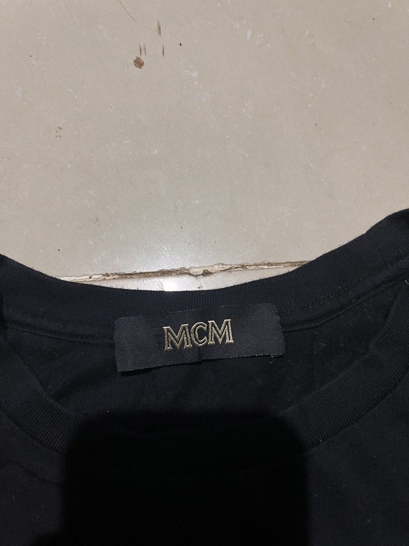 MCM WOMEN ARCHIVE GRAPHIC TEE (Category: Shirts) located in Valencia. Submitted by hunterxthrifter (Listing ID 1466132881, Image 3). Description: AUTHENTIC GUARANTEED NO ISSUE NEEDWASH SIZE SMALL COLOR RATE 9.6 or better W-21 L-24.
