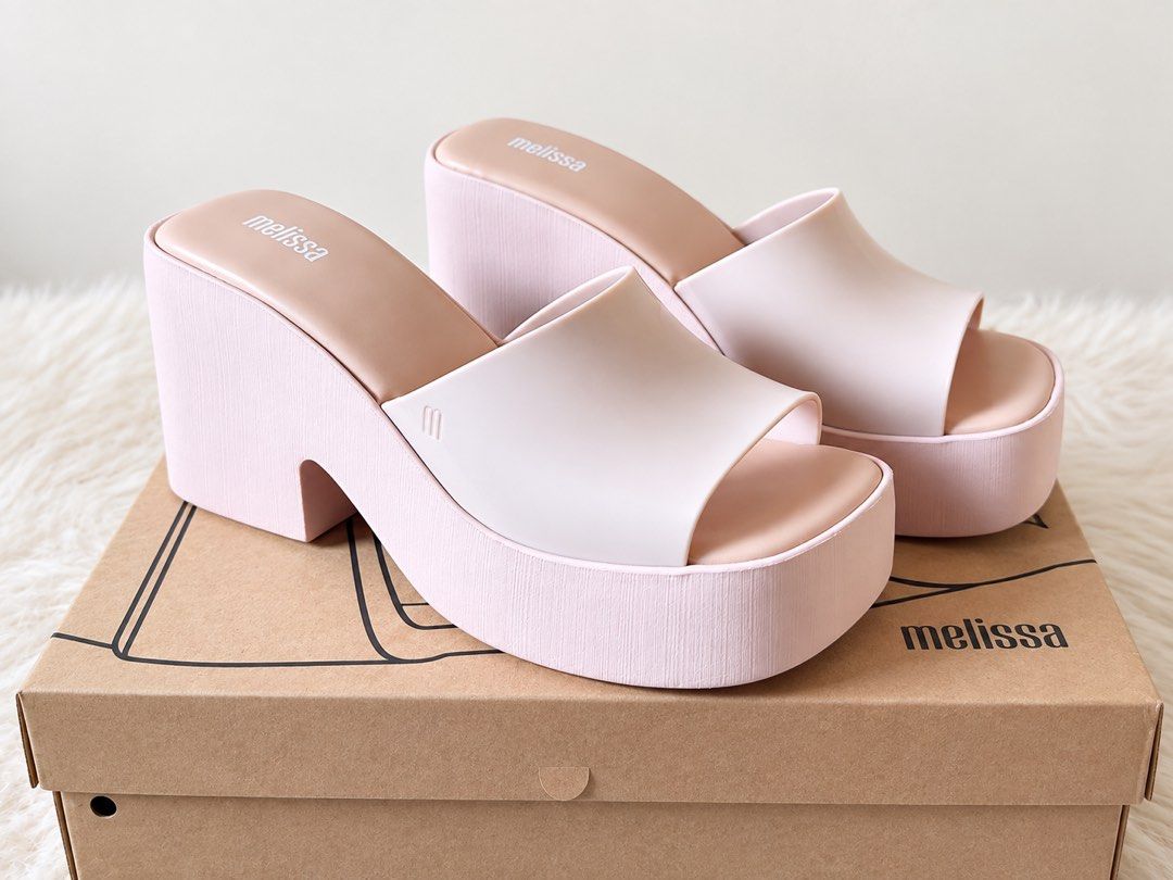 Mellisa posh wedge 38 (Category: Wedges) located in Makati City. Submitted by moiobsession (Listing ID 1466008477, Image 1). Description: mellisa posh size 38 with box pa very slightly used lng .