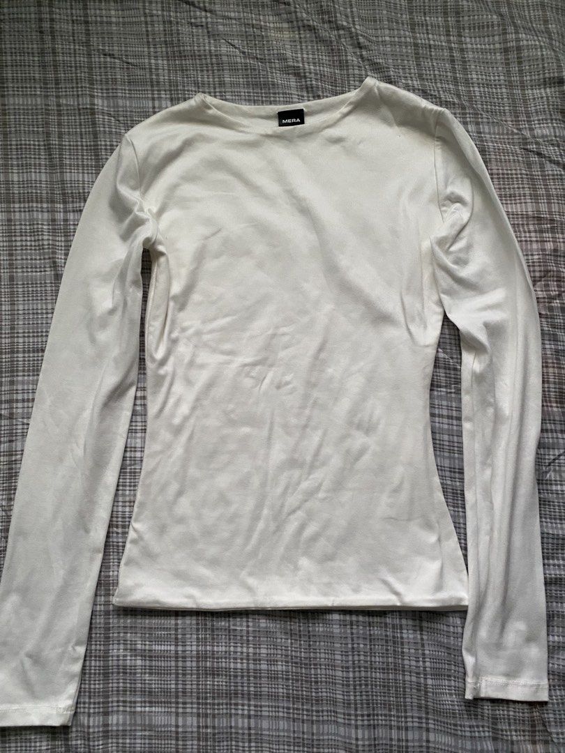 Mera White full length long sleeve top (Category: Longsleeves) located in Quezon City. Submitted by lovedbytali (Listing ID 1466127585, Image 1). Description: size m worn once has a small black mark at the lower back part (not noticeable).