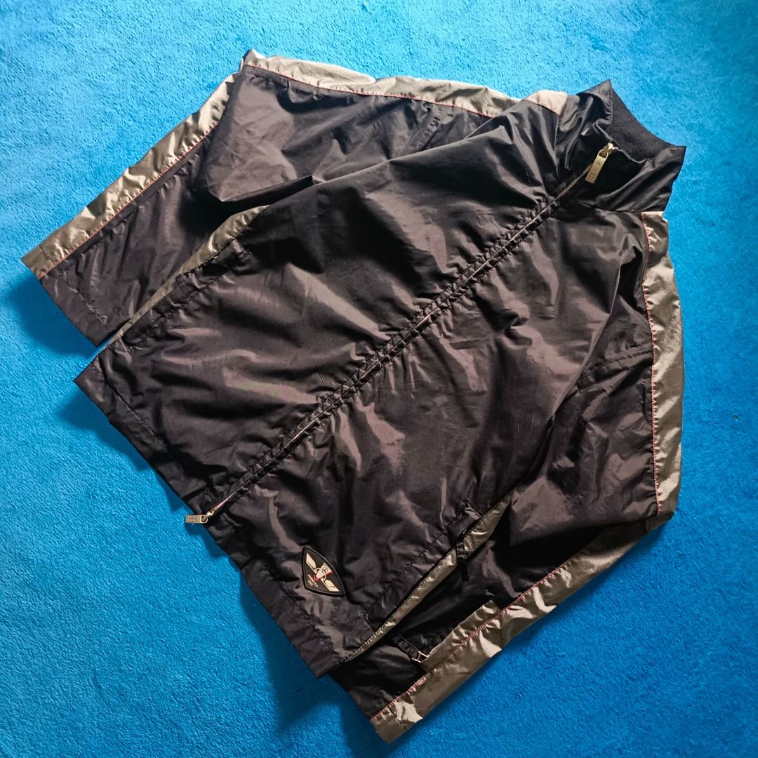 Mercedes-Benz Windbreaker Jacket (Category: Coats, Jackets and Outerwear) located in Antipolo. Submitted by juliane_thrift-declutters (Listing ID 1466128136, Image 2). Description: Mercedes-Benz Windbreaker Dimes: 25.5×23 Size: Large on tag Best fit to Medium to Large • No issue • Rubberized "FORMULA ONE" Logo • Complete Wash tags • Overall Condition: 9.8/10 * Color may vary due to lighting.
