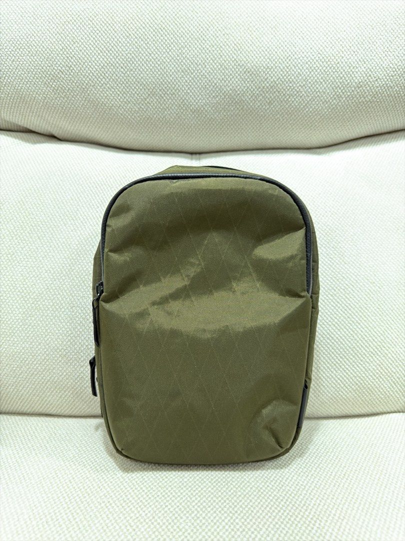 Alpaka Metro Sling Max (Category: Sling Bags) located in Cainta. Submitted by vnty.thrift (Listing ID 1465983806, Image 2). Description: Apaka Metro Sling Max 🎨 Color: Olive Green 👝 Material: X-Pac VX42, water-repellent fabric; 💸 Selling only for: ₱3,500 (orig price: $89) 📝 Condition & Notes: • Actual photos posted • No issues with original tags • Used only a few times • 100% original & authentic Alpaka 📍 Location: Cainta, Rizal 🚚 Pickup or