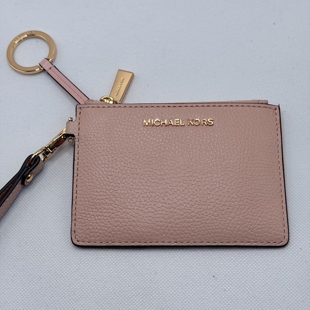 Michael kors Orig Coins Purse (Category: Wallets & Card holders) located in Quezon City. Submitted by ajandstevenshopscorner (Listing ID 1466155824, Image 1). Description: Fixed Price.