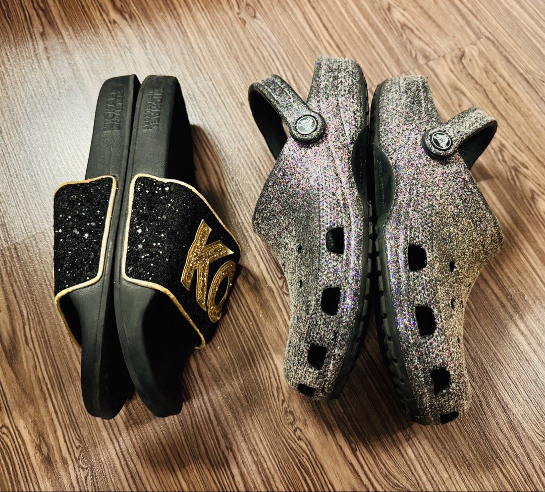 Michael Kors Slides and Glitter Crocs Bundle (Category: Flats & Sandals) located in Quezon City. Submitted by rhonadc (Listing ID 1465954313, Image 3). Description: Size W9 - Bundle deal: 2 pairs of easy slip-on shoes for your daily rotation - Pair 1: Michael Kors black slides featuring stylish gold glitter lettering across the strap - Pair 2: Grey glitter clogs equipped with secure heel straps and breathable ventilation holes - Condition: Normal