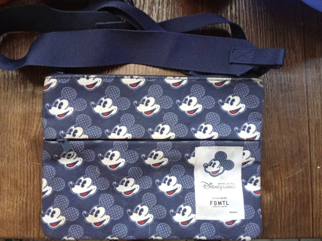 Mickey Mouse 2-Way zipper Sling Bag (Category: Everything Else Others) located in Quezon City. Submitted by myfpmshop (Listing ID 1466023809, Image 1). Description: Kong kong Disneyland Designers Collection (FDMTL Collection) Mickey Mouse 2-way zipper sling Bag used twice or trice still in good condition price is nego....
