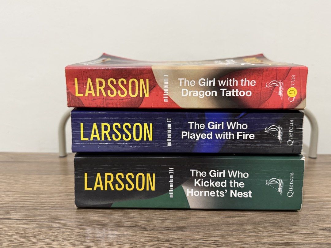 Millennium Trilogy by Stieg Larsson (3 Books) (Category: Storybooks) located in Magalang. Submitted by xeevain (Listing ID 1466051417, Image 2). Description: - Complete Millennium Trilogy by Stieg Larsson (Quercus paperback edition) - Includes: The Girl with the Dragon Tattoo, The Girl Who Played with Fire, and The Girl Who Kicked the Hornets' Nest - Iconic yellow spines and titles - Condition: Pages are naturally yellowed with minor cover creasi