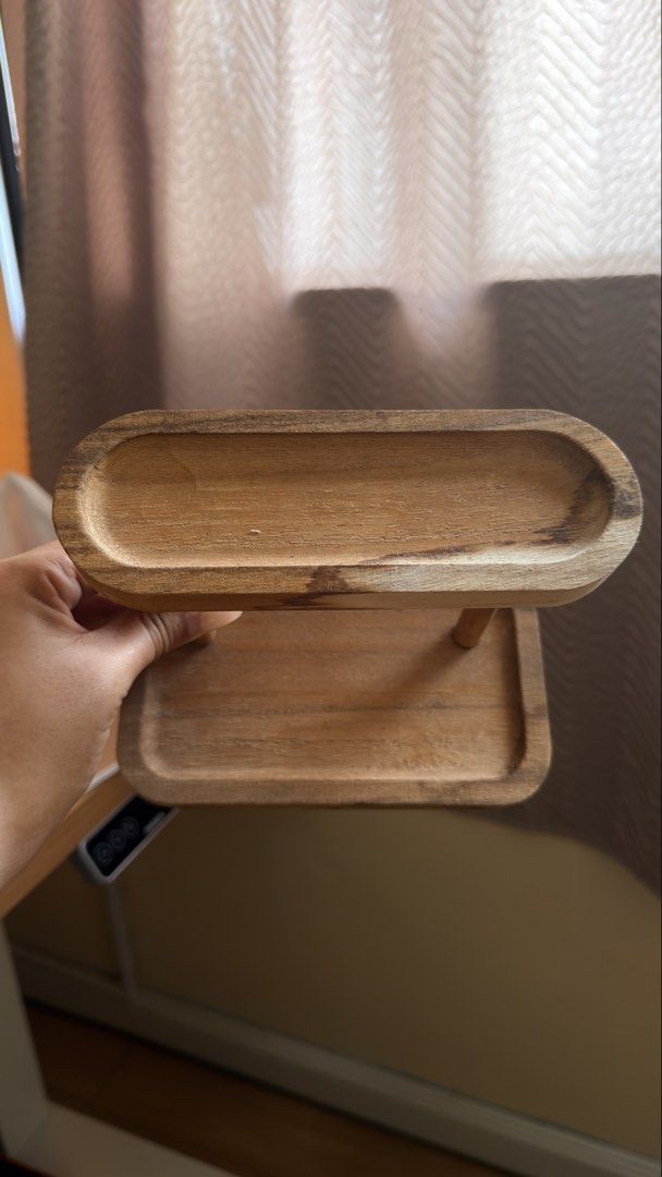 Mini Wooden two tier desktop organizer storage tray (Category: Shelves, Cabinets & Racks) located in Cebu City. Submitted by eynjlin (Listing ID 1465969560, Image 2). Description: - Mini Two-tier wooden organizer tray with a stylish natural grain finish - Bottom tier features a spacious rectangular shape with raised edges - Top tier has a narrower, elegant oval shape - Ideal for desk organization, small accessories, keys, and everyday carry items