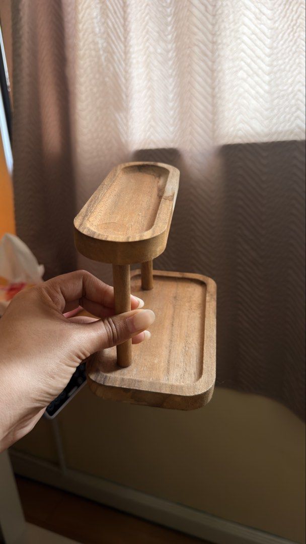 Mini Wooden two tier desktop organizer storage tray (Category: Shelves, Cabinets & Racks) located in Cebu City. Submitted by eynjlin (Listing ID 1465969560, Image 3). Description: - Mini Two-tier wooden organizer tray with a stylish natural grain finish - Bottom tier features a spacious rectangular shape with raised edges - Top tier has a narrower, elegant oval shape - Ideal for desk organization, small accessories, keys, and everyday carry items