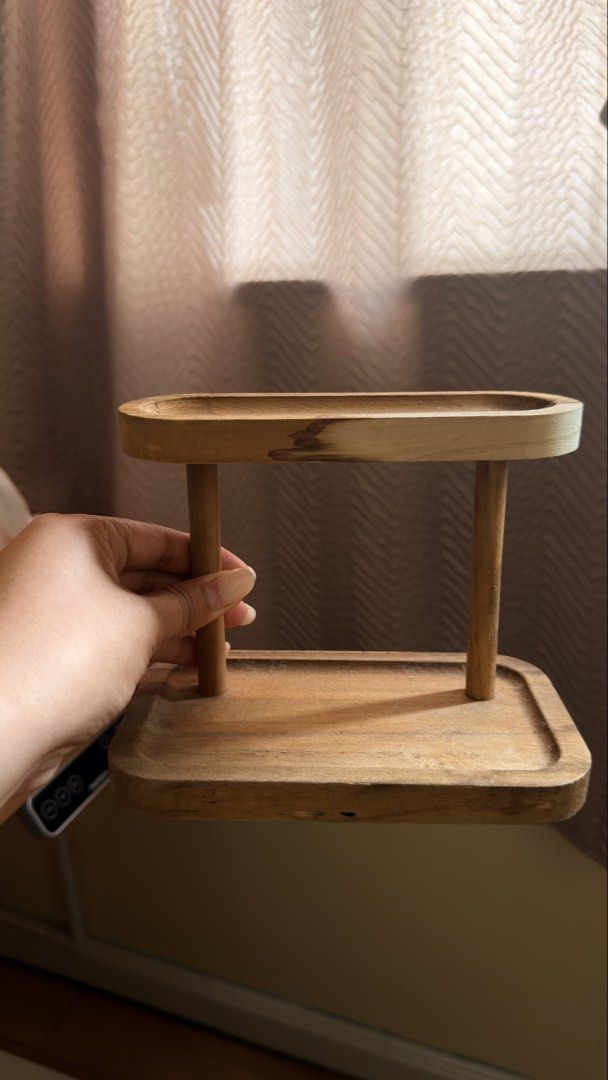 Mini Wooden two tier desktop organizer storage tray (Category: Shelves, Cabinets & Racks) located in Cebu City. Submitted by eynjlin (Listing ID 1465969560, Image 1). Description: - Mini Two-tier wooden organizer tray with a stylish natural grain finish - Bottom tier features a spacious rectangular shape with raised edges - Top tier has a narrower, elegant oval shape - Ideal for desk organization, small accessories, keys, and everyday carry items