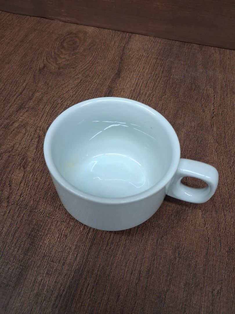 Minimalist White Ceramic Coffee Mug with Loop Handle - Set of 3 (Category: Coffee & Tea Tableware) located in Taguig. Submitted by ssvcn (Listing ID 1465971741, Image 2). Description: - Product: Simple white ceramic coffee mug - Design: Unique circular loop handle on top and smooth glazed finish - Aesthetic: Clean, minimalist look that matches any kitchen setup - Best for: Morning coffee, tea, or hot cocoa - Condition: Brand new.