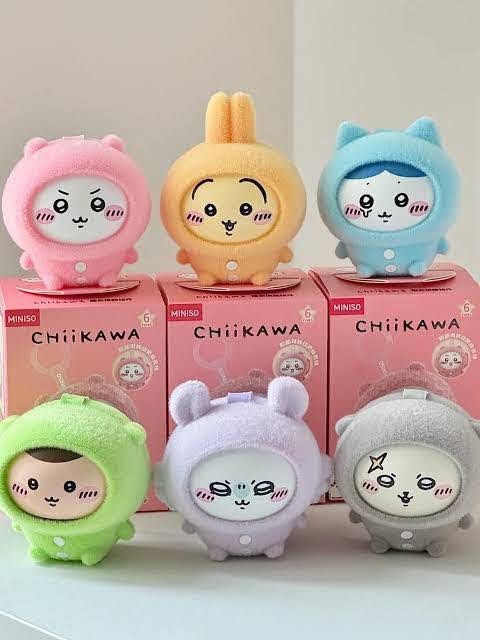 Miniso Chiiikawa Plush Keychain Blind Box Figures (Category: Plushies & Soft Toys) located in Makati City. Submitted by xten18 (Listing ID 1466100394, Image 1). Description: 2x Rakko available - Brand: Miniso X Chiikawa - Item: Plush keychain with hanging loop attachment - Design: Characters dressed in cute, fuzzy animal onesies - Available Colors: Pink, yellow, blue, green, purple, and grey (multiple grey figures in stock) - Inclusions: Original