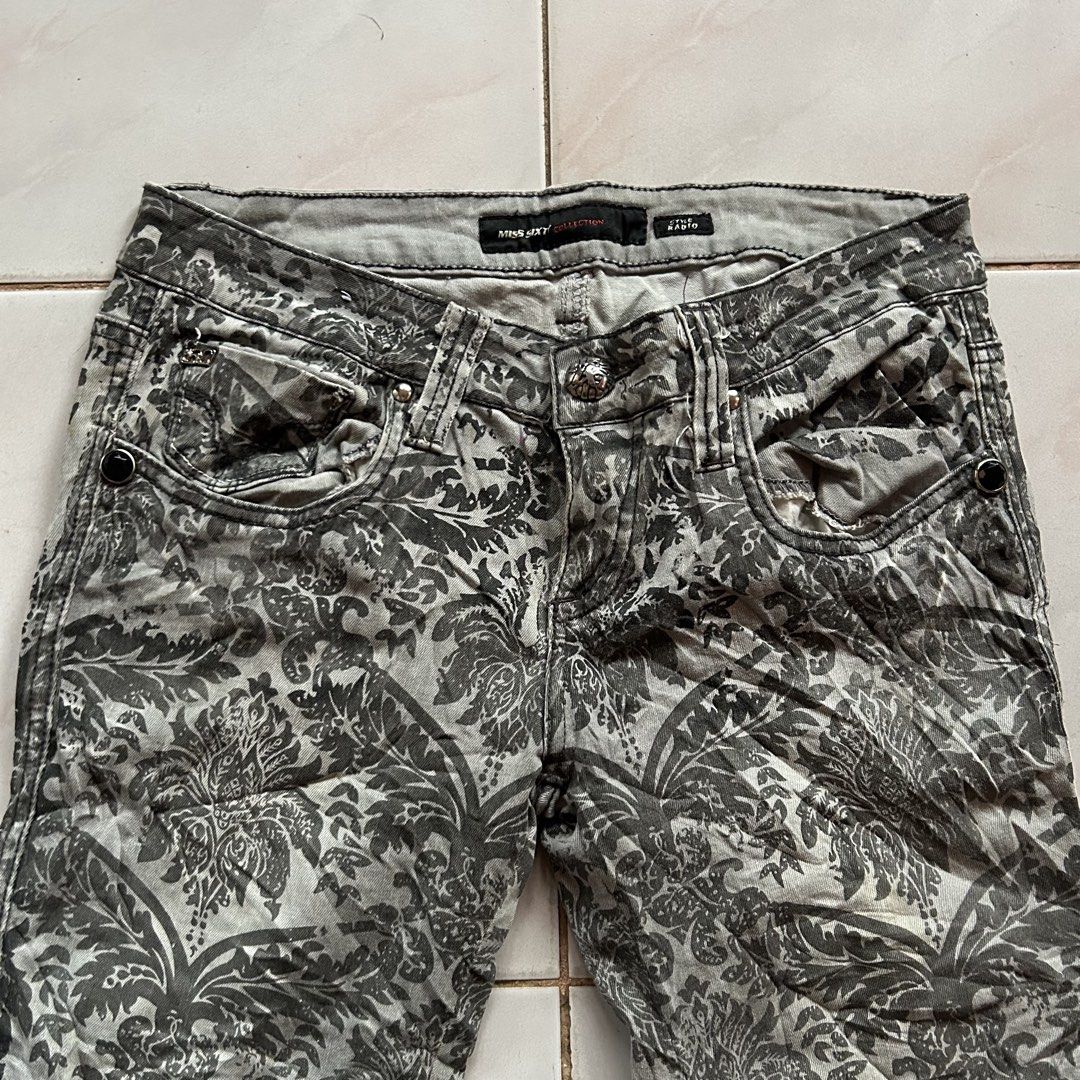 Miss Sixty Damask Print Jeans 🔥 (Category: Jeans) located in Jinoba-an. Submitted by eegiboy (Listing ID 1466032987, Image 2). Description: - Brand: Miss Sixty - Style: Low rise, straight leg - Pattern: All-over grey and black damask - Details: Front and back pockets, branded buttons and rivets - Signature: Metal Miss Sixty logo plaque on the back right pocket - Condition: Excellent pre-loved condition (Ready to wear!) - Mode of Payment: GCash -