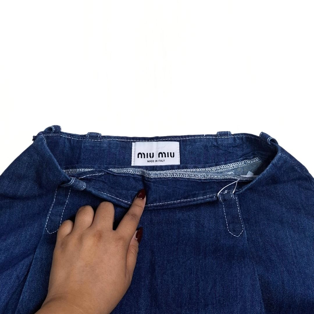 MIU MIU skirt (Category: Skirts) located in Baguio. Submitted by a.ugustt (Listing ID 1465960209, Image 2). Description: 27 | L: 14.5" soft denim | dark blue not stretchable | high-waisted.