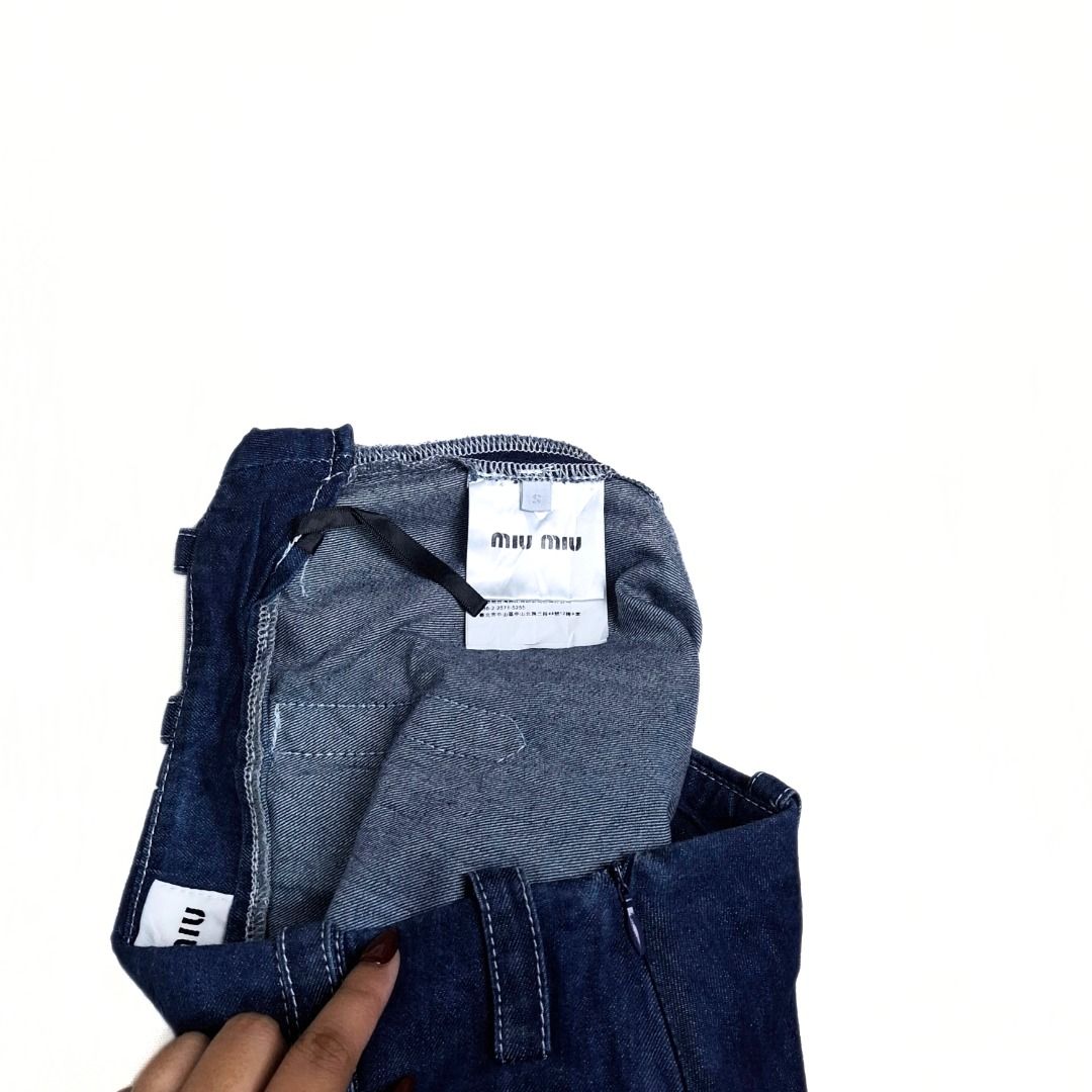 MIU MIU skirt (Category: Skirts) located in Baguio. Submitted by a.ugustt (Listing ID 1465960209, Image 3). Description: 27 | L: 14.5" soft denim | dark blue not stretchable | high-waisted.