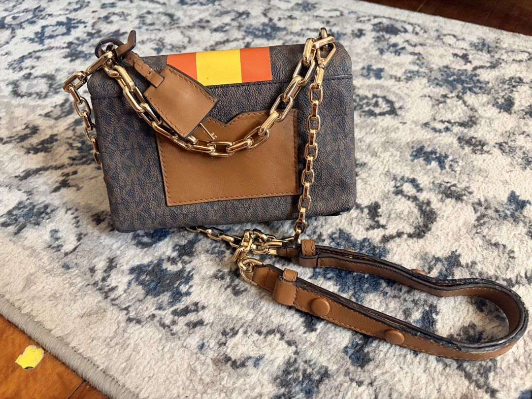 Mk crossbody (Category: Cross-body Bags) located in San Pascual. Submitted by s3resale (Listing ID 1465964711, Image 2). Description: Rubber linning issue s strap lang(Due to improper storage)pero gold pa hardware. Free sf around luzon area only. .