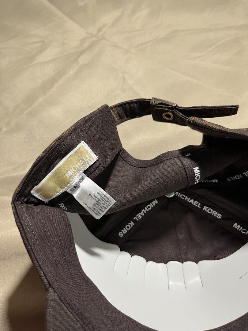 MK MICHAEL KORS (Category: Hats & Beanies) located in Quezon City. Submitted by headline. (Listing ID 1466116134, Image 3). Description: MICHAEL KORS AOP BROWN WOMEN EXCELLENT CONDITION FOR ONLY:1,250php +SHIPPING FEE.