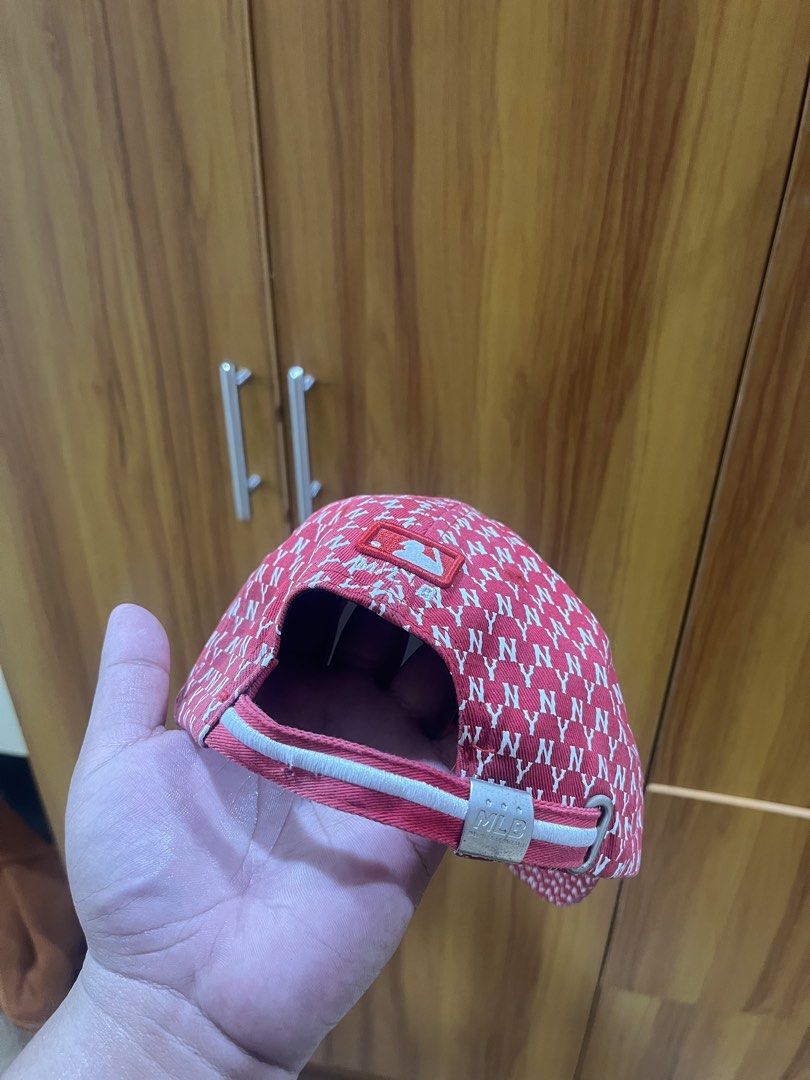 MLB New York Yankees Monogram Red Cap Hat (Category: Caps & Hats) located in Manila. Submitted by christian048 (Listing ID 1466091517, Image 3). Description: - Authentic red MLB New York Yankees baseball cap - Eye-catching all-over white NY monogram pattern with embroidered front logo - Adjustable strap with metal buckle closure for a custom fit - Clean interior sweatband with all original tags and lining intact - Versatile accessory, perfect for