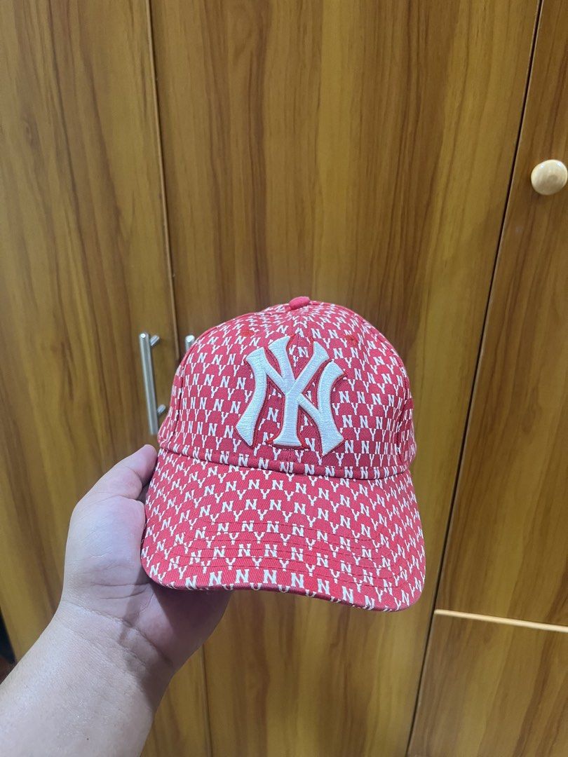 MLB New York Yankees Monogram Red Cap Hat (Category: Caps & Hats) located in Manila. Submitted by christian048 (Listing ID 1466091517, Image 2). Description: - Authentic red MLB New York Yankees baseball cap - Eye-catching all-over white NY monogram pattern with embroidered front logo - Adjustable strap with metal buckle closure for a custom fit - Clean interior sweatband with all original tags and lining intact - Versatile accessory, perfect for
