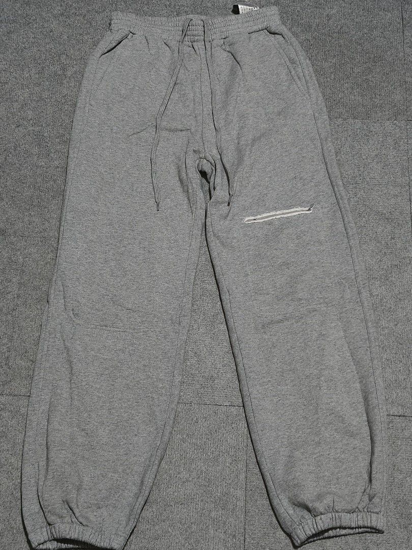 MM6 Maison Margiela Grey Distressed Sweatpants (Category: Other Bottoms) located in La Trinidad. Submitted by beenaged (Listing ID 1465995326, Image 1). Description: MM6 Maison Margiela sweatpants - Size 27-31 - Length 42 Good as new price 1580 Location Baguio City Shipping nationwide .