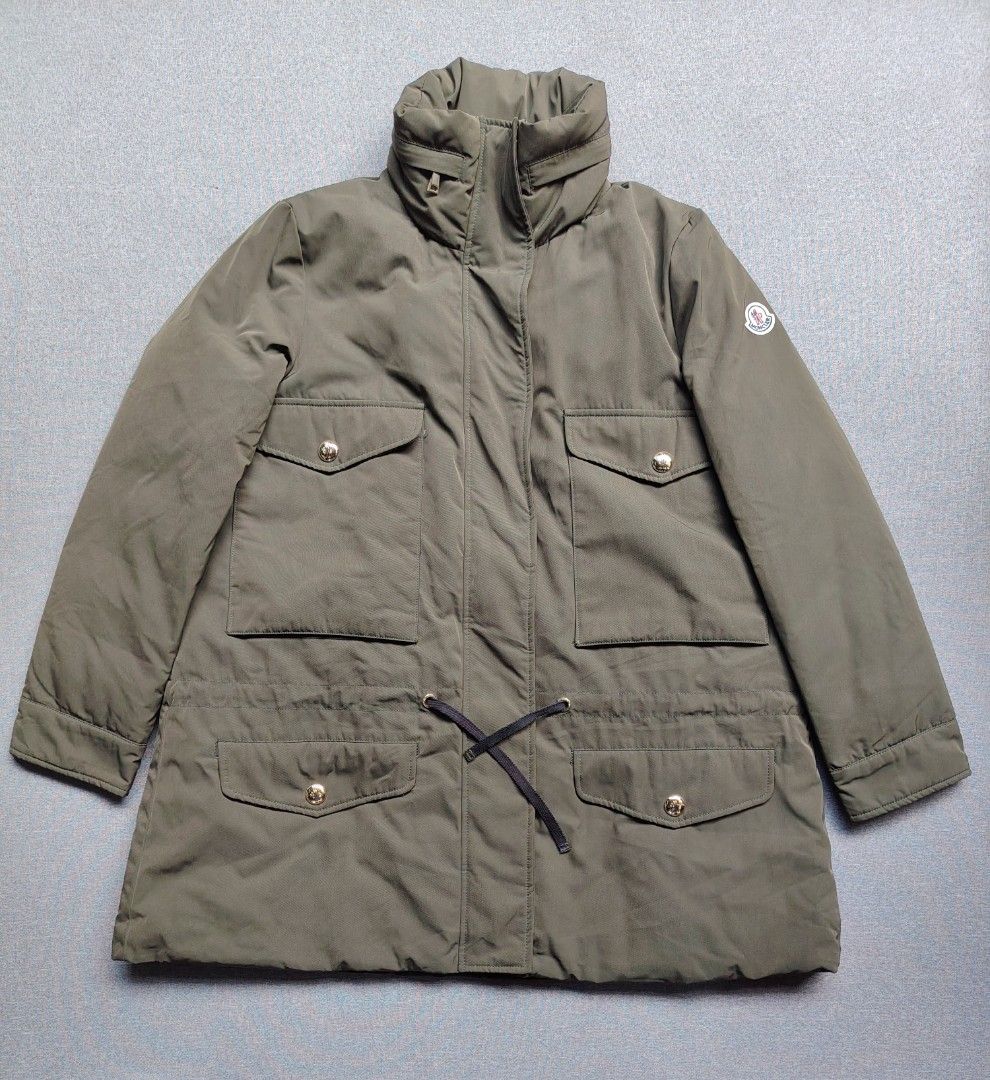 Moncler Margarita Parka Jacket (Category: Coats, Jackets and Outerwear) located in Taguig. Submitted by _theroom.ph (Listing ID 1465986878, Image 1). Description: - Authentic Moncler puffer parka in stylish olive green - High stand-up collar with cool zip details - Four front flap pockets featuring gold-tone branded buttons - Adjustable drawstring waist to flatter your shape - Classic Moncler felt logo patch on the sleeve - Cozy black quilted inn