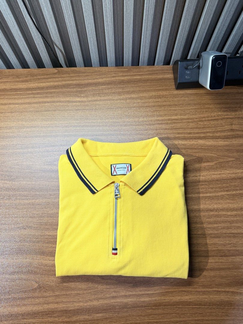 Moncler Polo shir Zip (Category: Activewear) located in Bulacan. Submitted by jomar_0705 (Listing ID 1466151173, Image 1). Description: Moncler Poloshirt Zip XL on tag W22 L27 As new No issue.